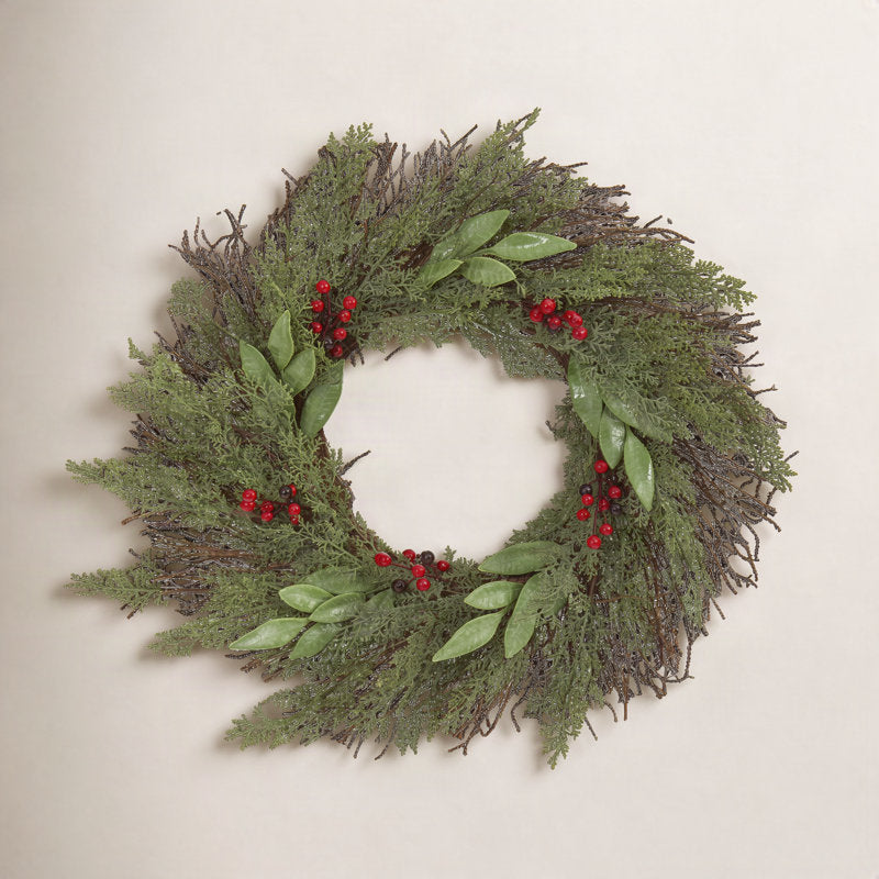 26" Berry Christmas Wreath hanging on a front door