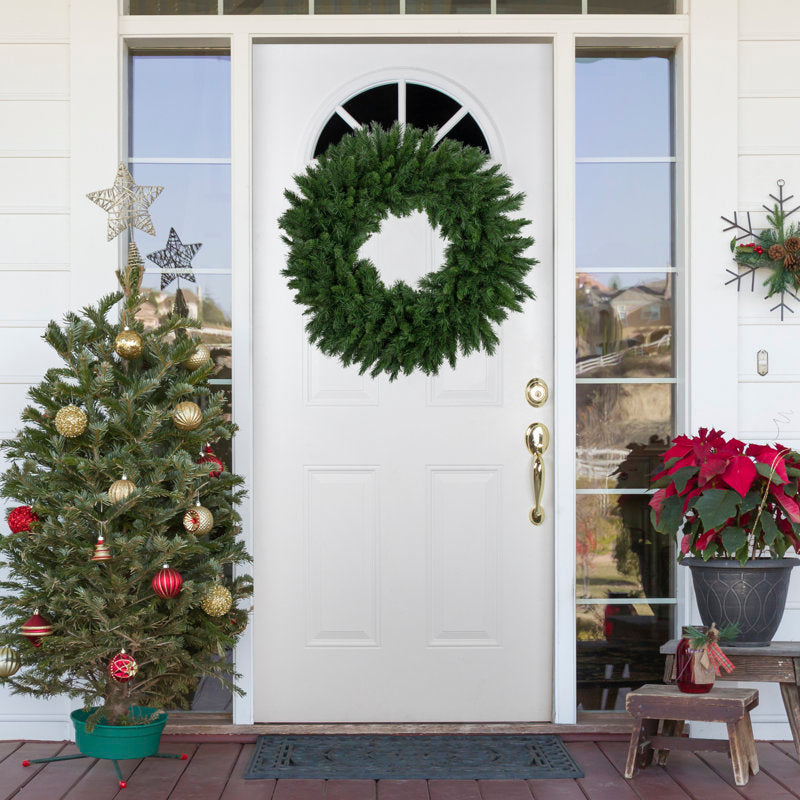 Artificial Christmas Wreath hanging on a front door