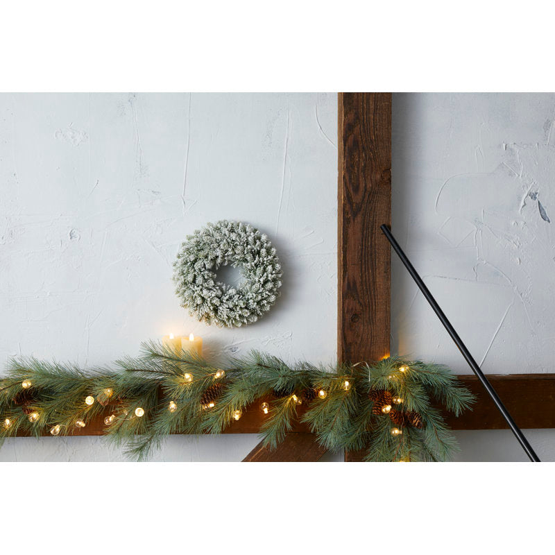 20" Pre-Lit Christmas Wreath displayed on a front door