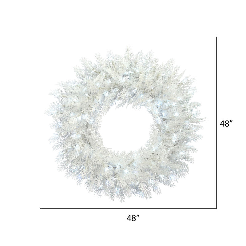 24" Artificial Christmas Wreath as a festive door display