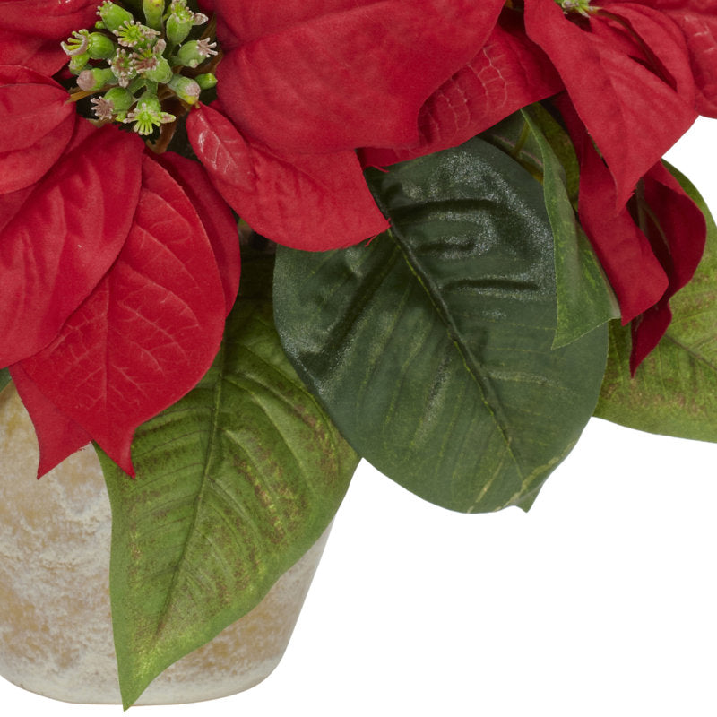 Holiday floral arrangement in a vase