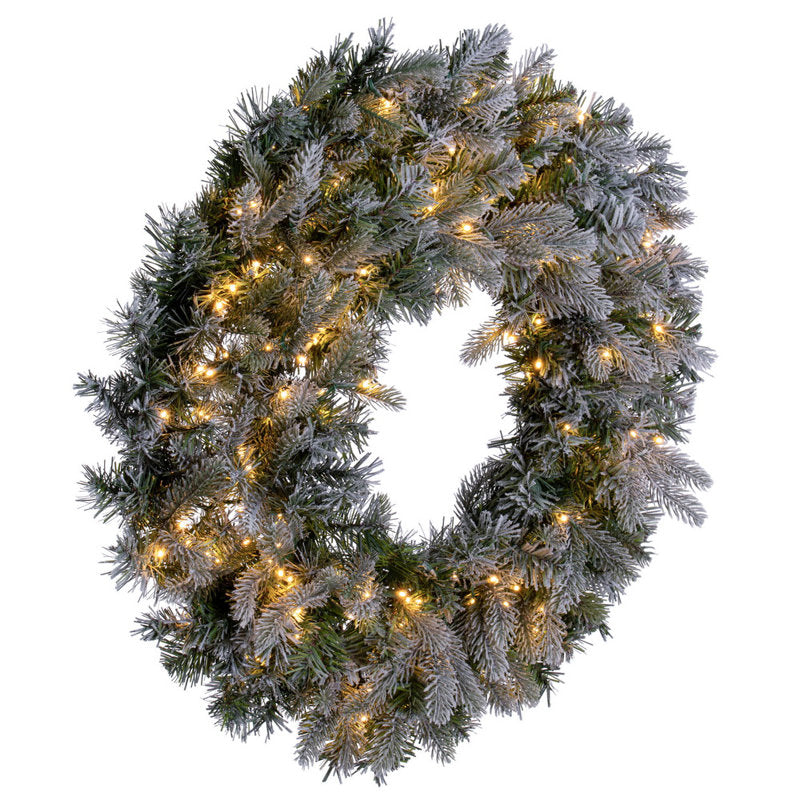 Pine Christmas Wreath hung on a wooden door