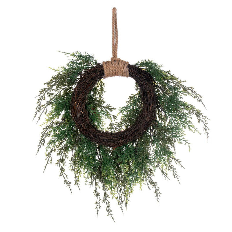 24" Pre-Lit Artificial Pine Christmas Wreath hung on a wooden door