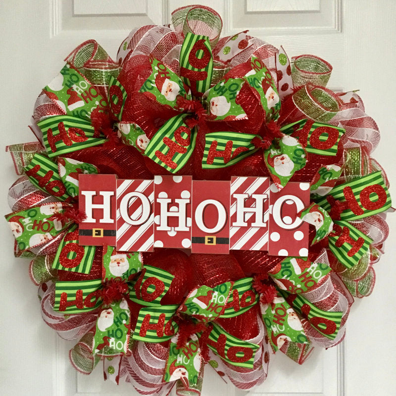 24" Artificial Christmas Wreath as a festive door display