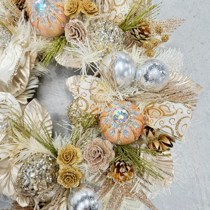 Pre-Lit Glitter Artificial Eucalyptus Christmas Wreath hanging on a front door