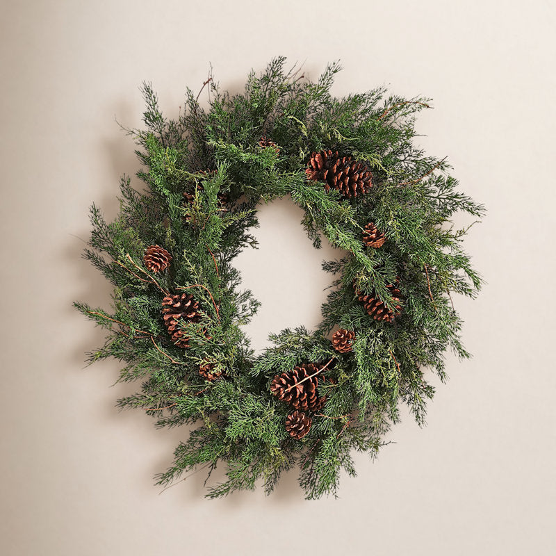 Artificial Pine Christmas Wreath hanging on a front door
