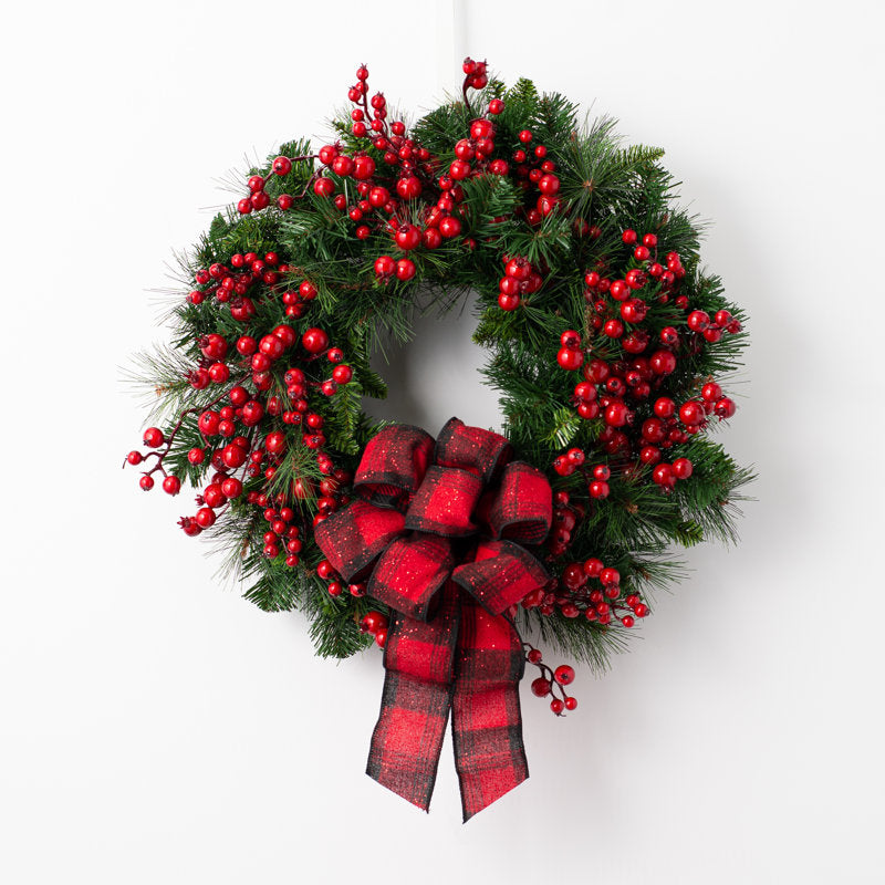 20" Artificial Christmas Wreath hanging on a front door