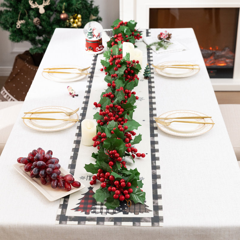 5 ft Artificial Berry Christmas Garland styled along a festive mantel