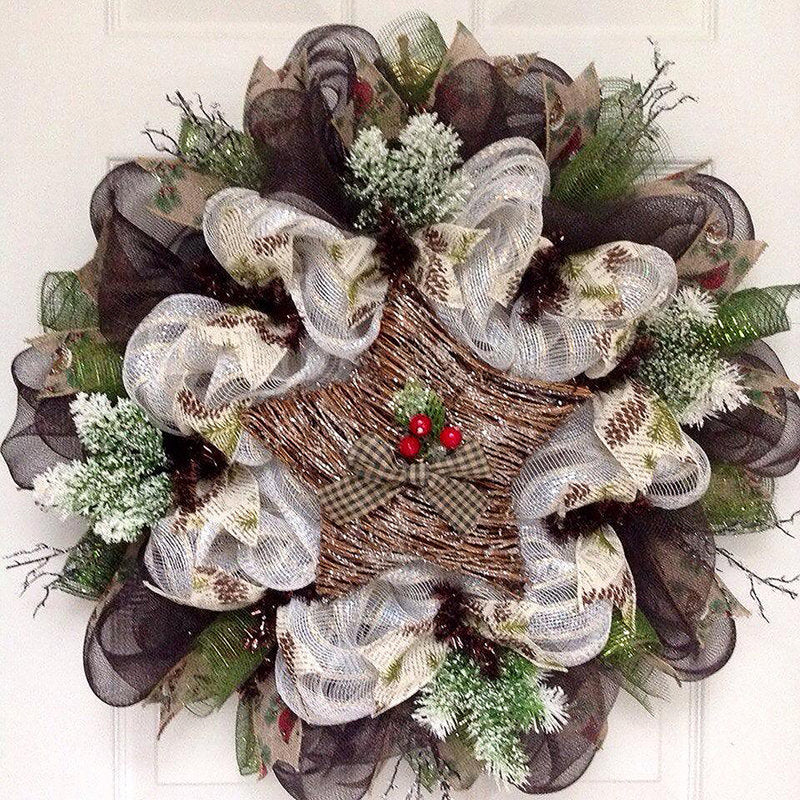 Christmas Wreath hung on a wooden door