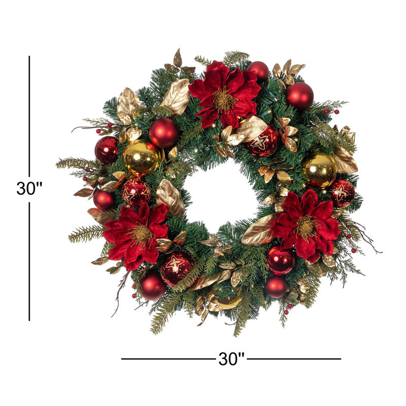 12" Artificial Christmas Wreath displayed on a front door