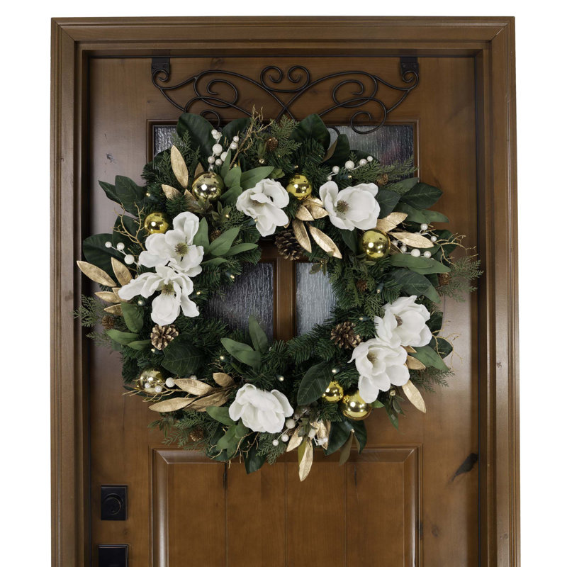 19" Flocked Artificial Pine Christmas Wreath on an outdoor entryway