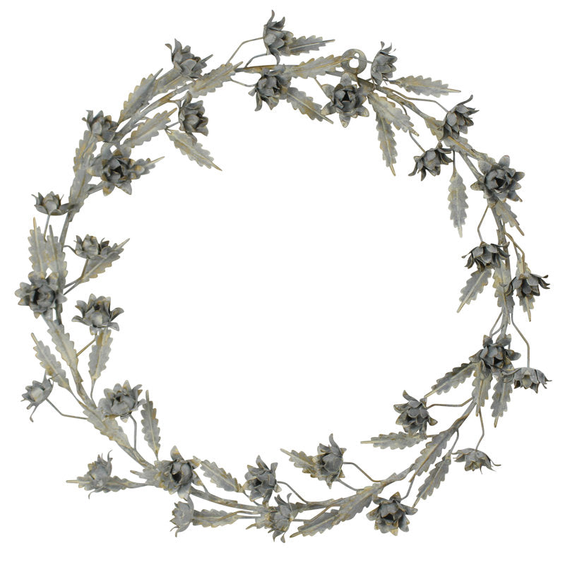 Christmas Wreath hung on a wooden door