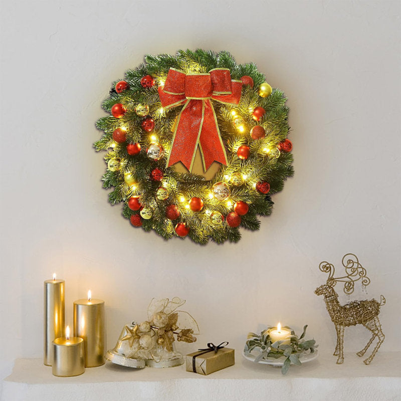 24" Artificial Ornament Christmas Wreath on a living room wall