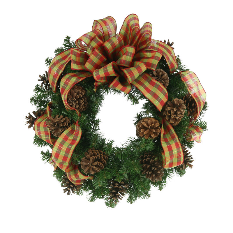Pine Christmas Wreath hung on a wooden door