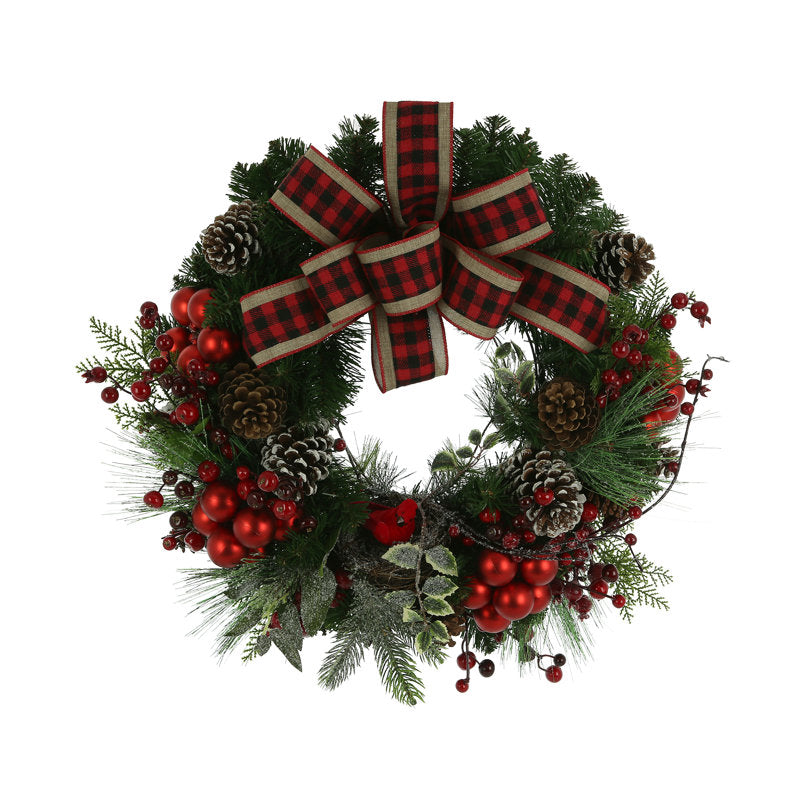 Artificial Pine Christmas Wreath hanging on a front door