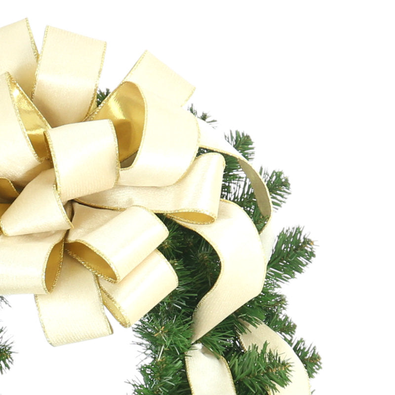 24" Pre-Lit Artificial Pine Christmas Wreath hung on a wooden door