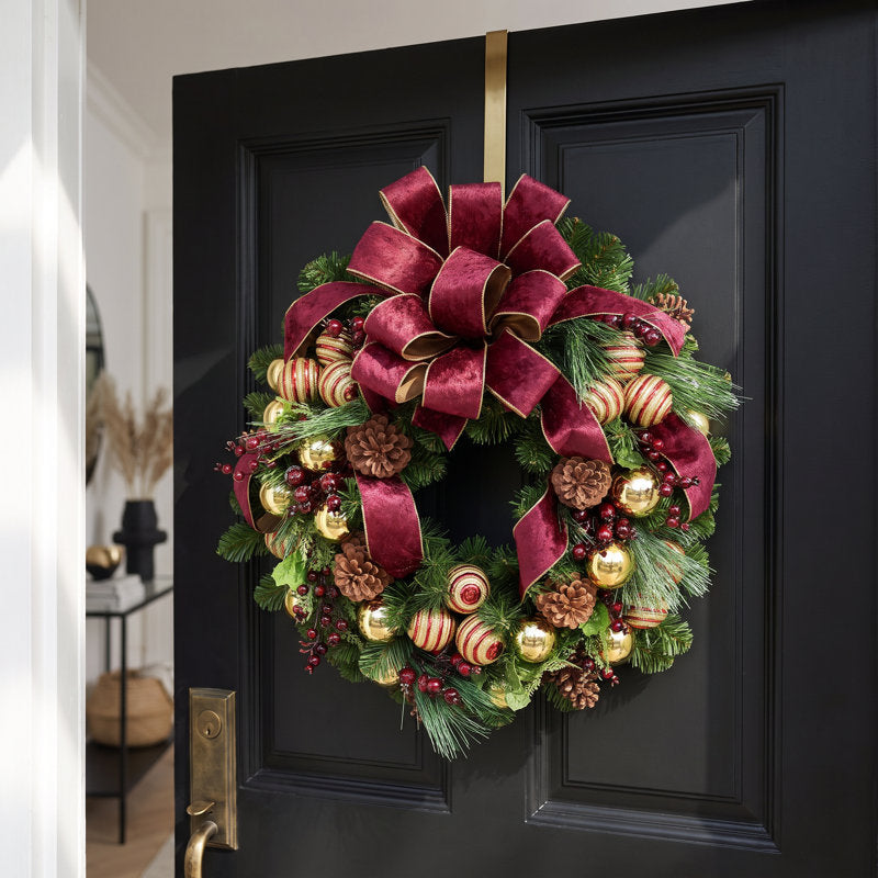 24" Pre-Lit Christmas Wreath hanging on a front door