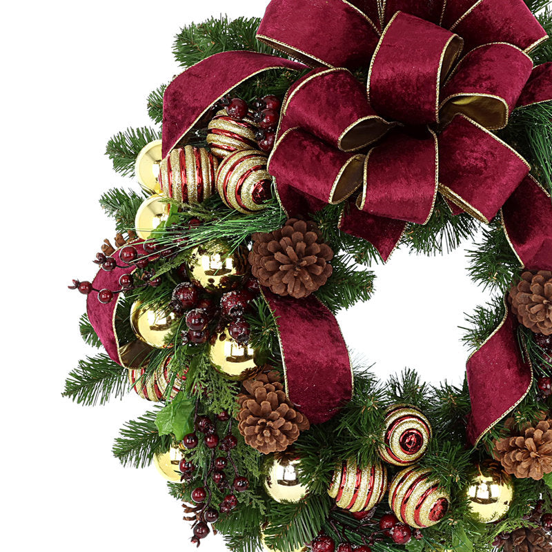24" Pre-Lit Christmas Wreath hanging on a front door