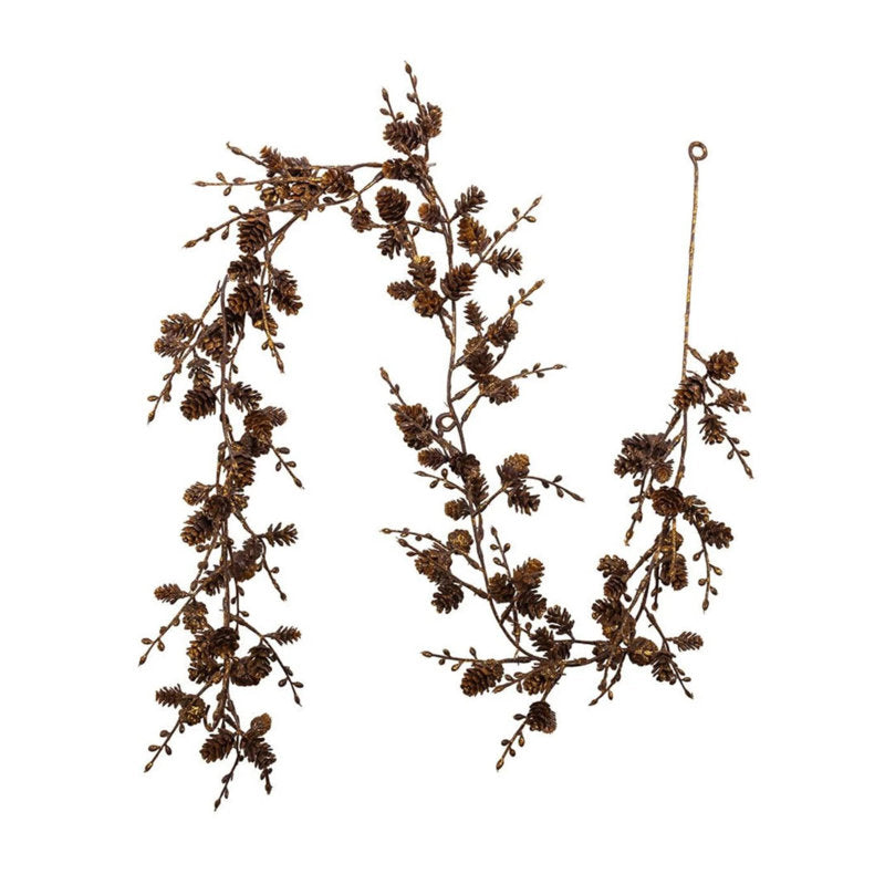 9 ft Artificial Christmas Garland styled along a festive mantel