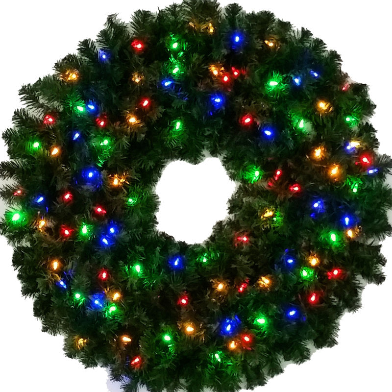 36" Pre-Lit Christmas Wreath hung on a wooden door