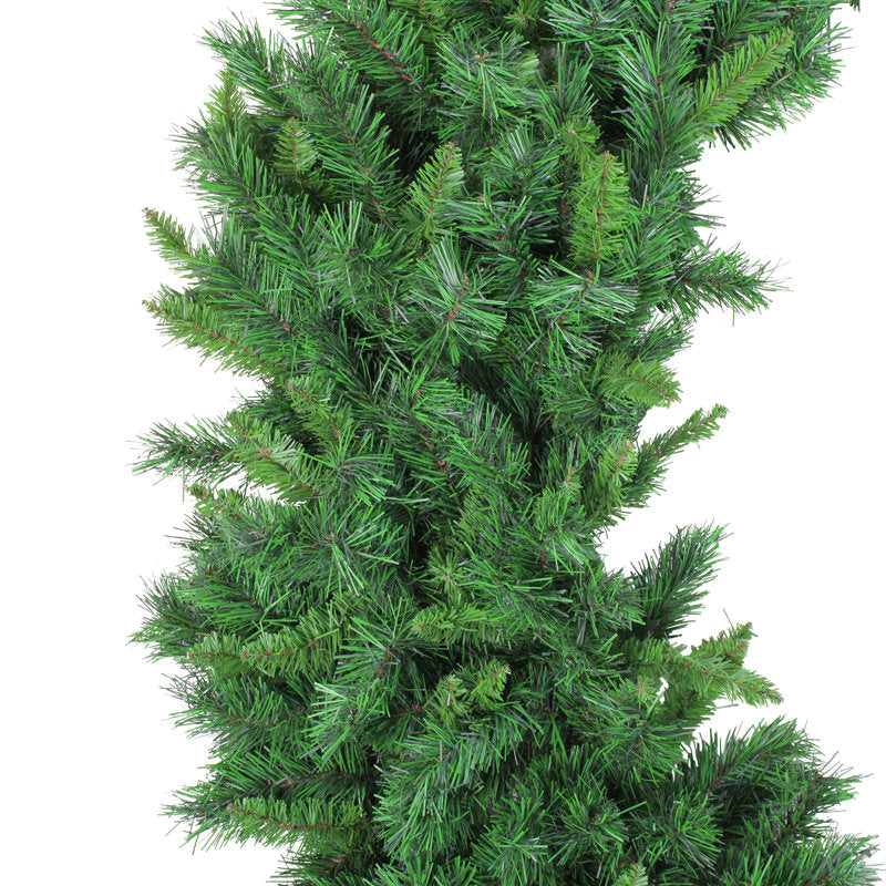 Artificial Pine Christmas Wreath displayed on a front door