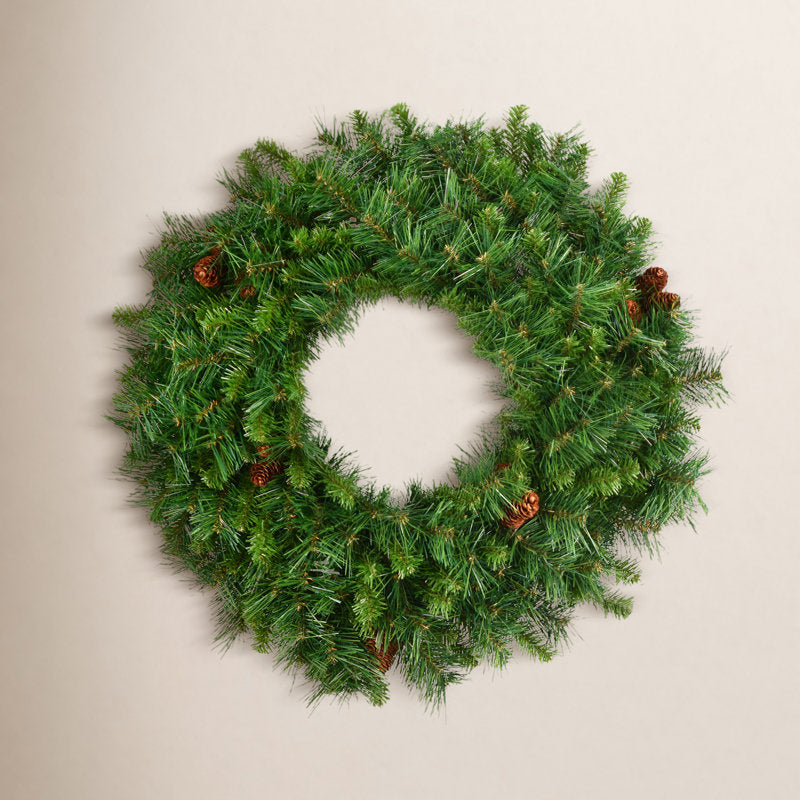 Artificial Pine Christmas Wreath hanging on a front door