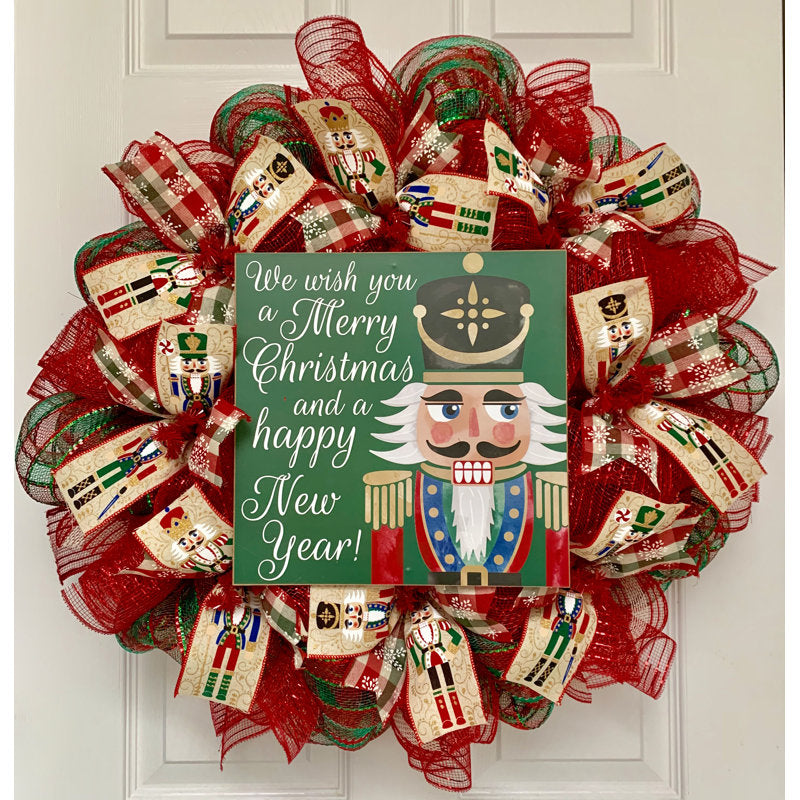 Artificial Pine Christmas Wreath hanging on a front door