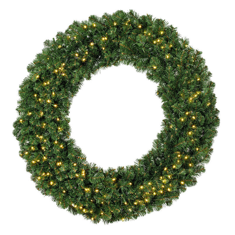24" Pre-Lit Artificial Pine Christmas Wreath hung on a wooden door