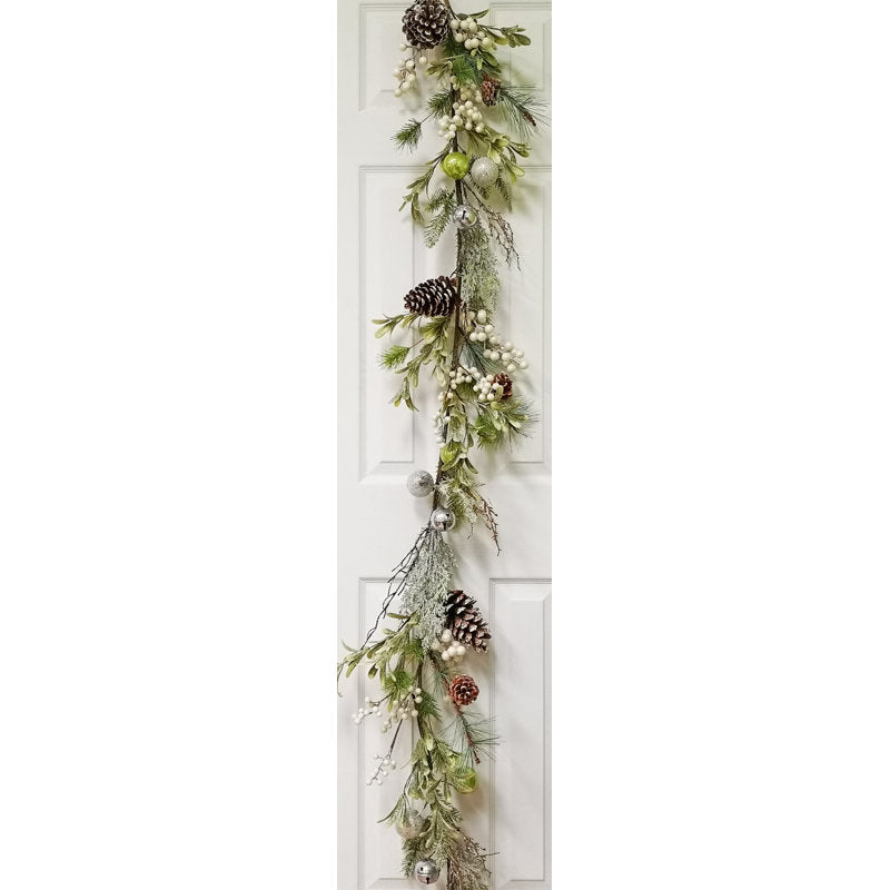 5 ft Artificial Cedar Christmas Garland wrapped around a staircase banister