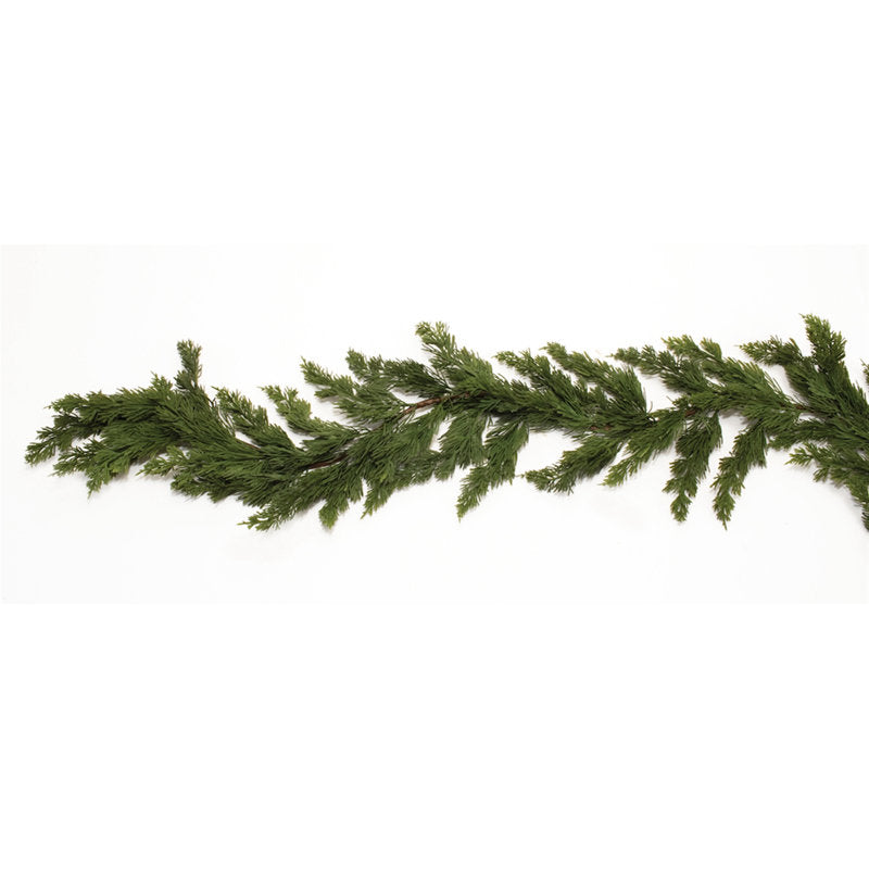 9 ft Pre-Lit Artificial Pine Christmas Garland wrapped around a staircase banister