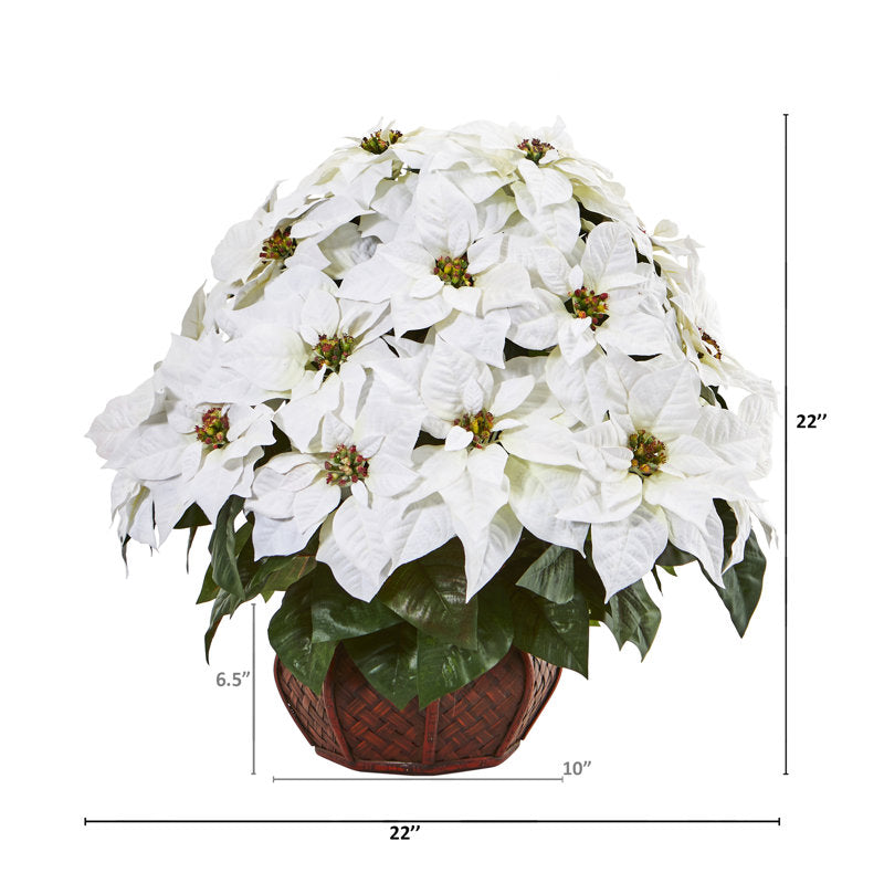 Artificial poinsettia arrangement in a planter