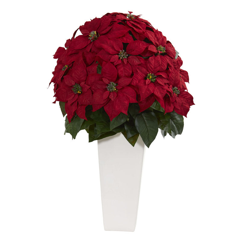 Poinsettia floral arrangement in a planter