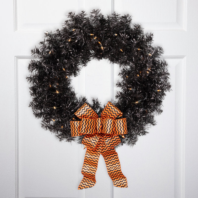 24" Artificial Christmas Wreath as a festive door display