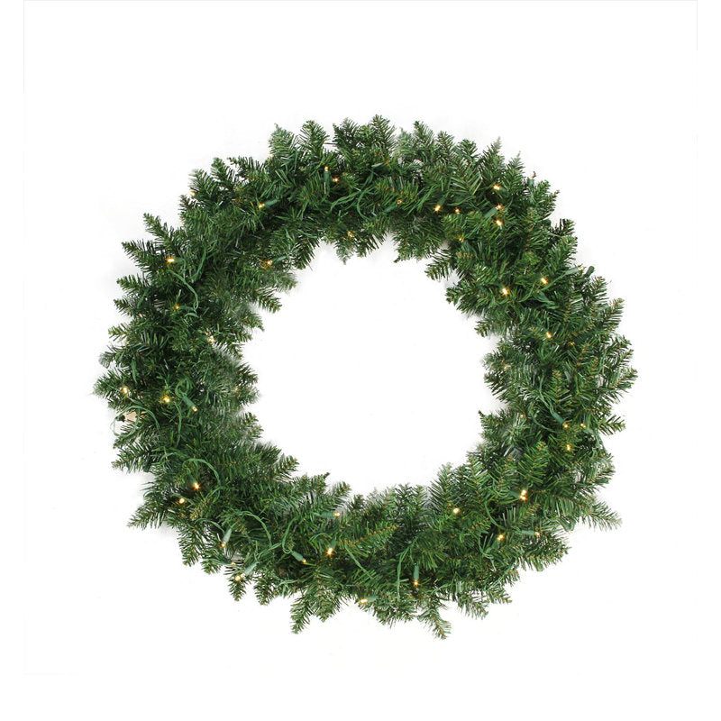 Pre-Lit Artificial Fir Christmas Wreath hanging on a front door