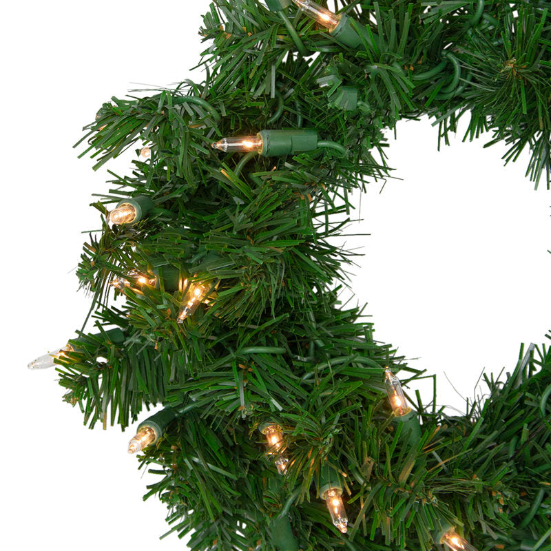 24" Christmas Wreath hanging on a front door