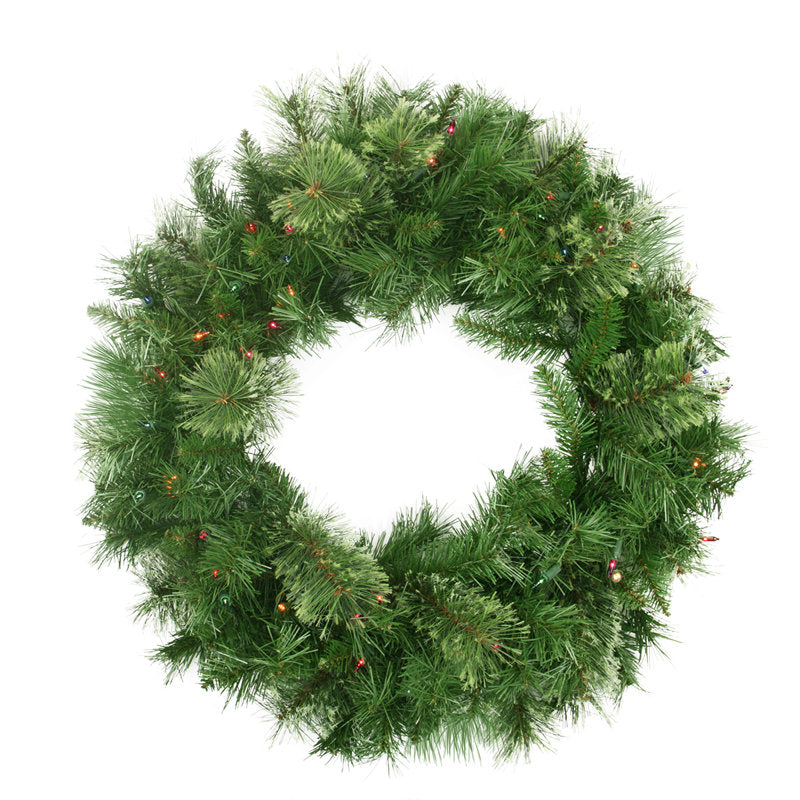 Pre-Lit Artificial Pine Christmas Wreath hung on a wooden door