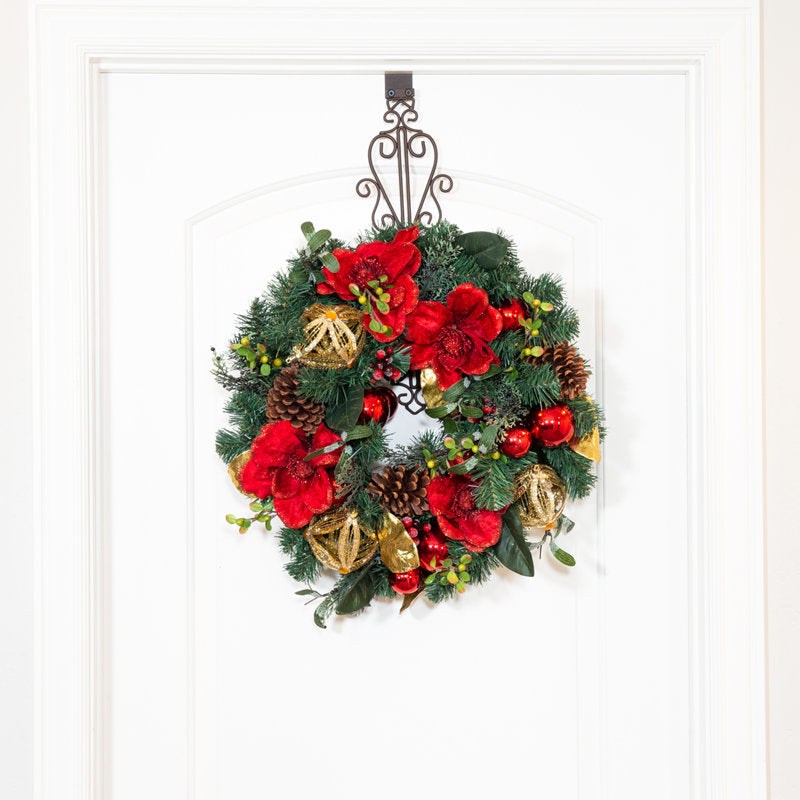 24" Pre-Lit Artificial Christmas Wreath hung on a wooden door