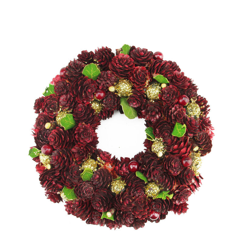 Artificial Pine Christmas Wreath displayed on a front door
