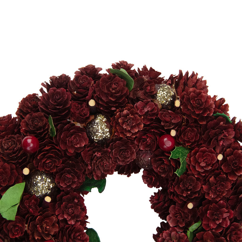 24" Farmhouse Artificial Eucalyptus Christmas Wreath hung on a wooden door