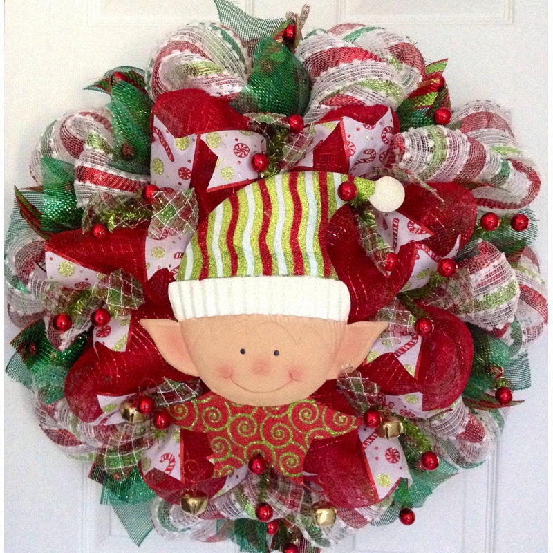 Elf Christmas Wreath hung on a wooden door