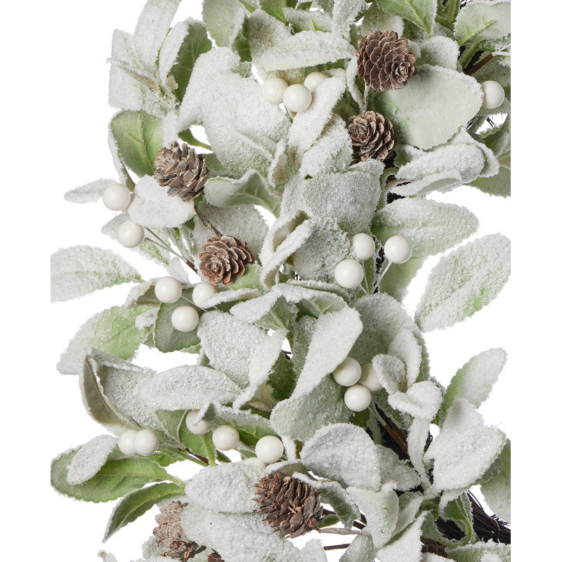 24" Pre-Lit Artificial Pine Christmas Wreath hung on a wooden door