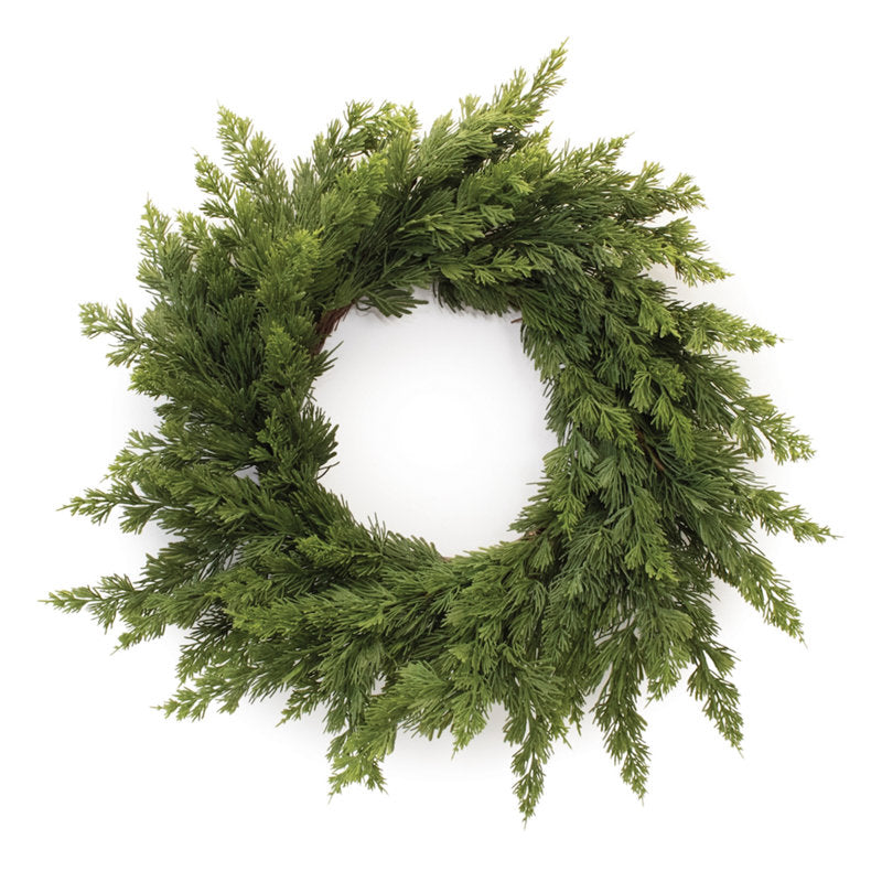Pine Christmas Wreath hanging on a front door