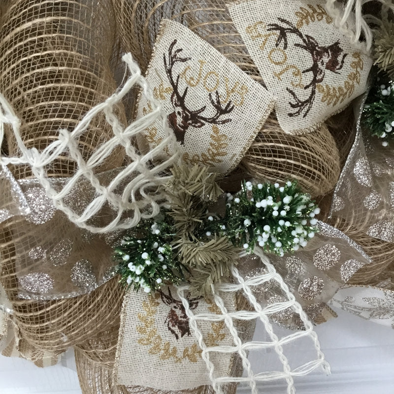 Artificial Christmas Wreath displayed on a front door
