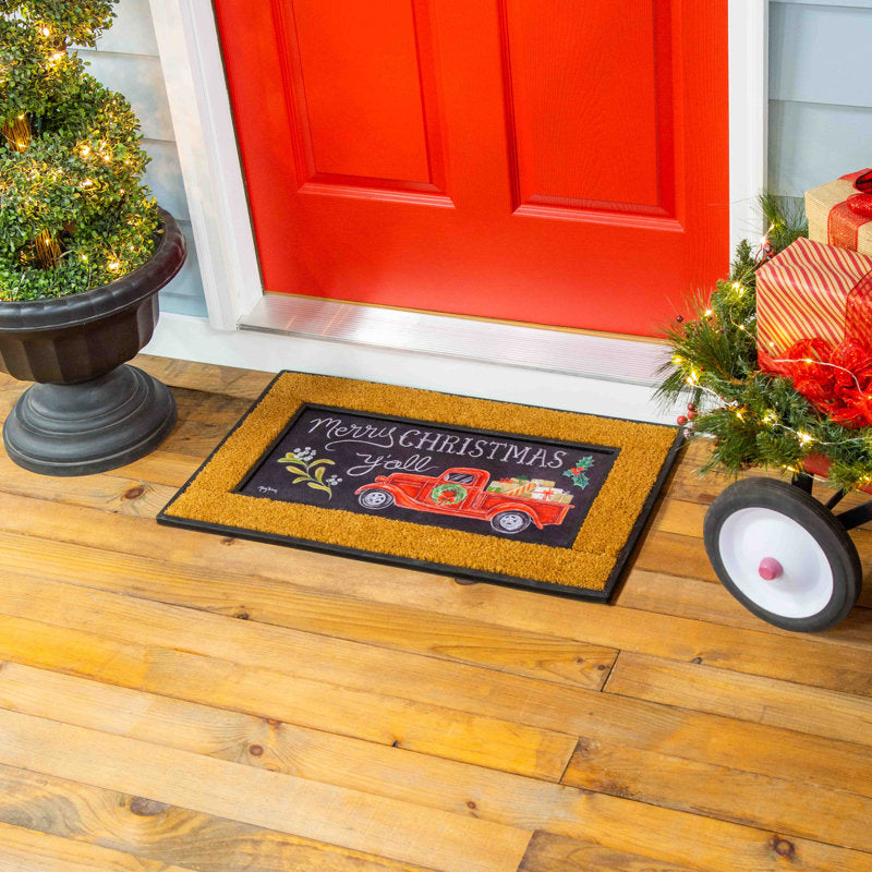 Winter Christmas Merry Christmas Y''all Red Truck Sassafras Switch 22 in. x 10 in. Non-Slip Outdoor Door Mat