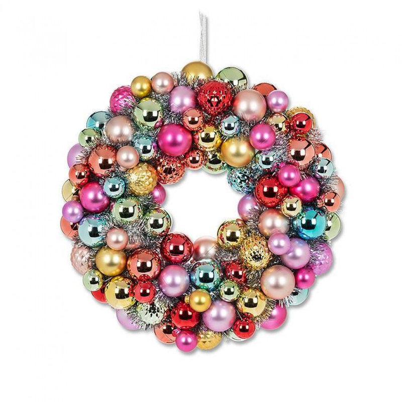 Christmas Wreath hung on a wooden door