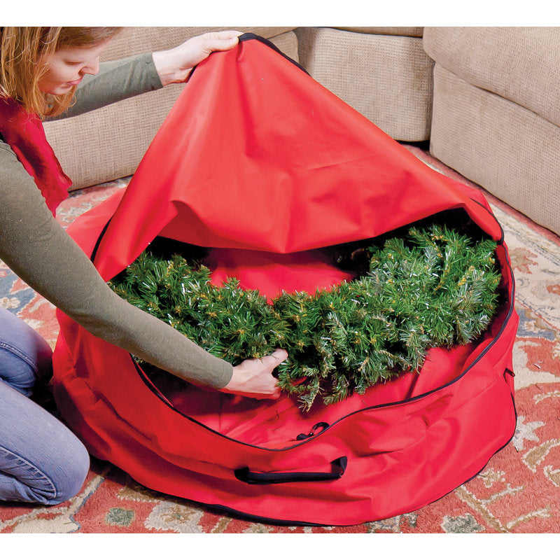 Wreath storage solution for protecting holiday wreaths between seasons