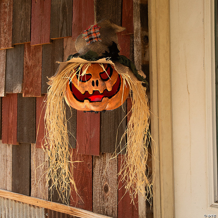 11 3/4" x 27 1/2" Hanging Pumpkin Head Plastic Halloween Decoration | USA Decoration®