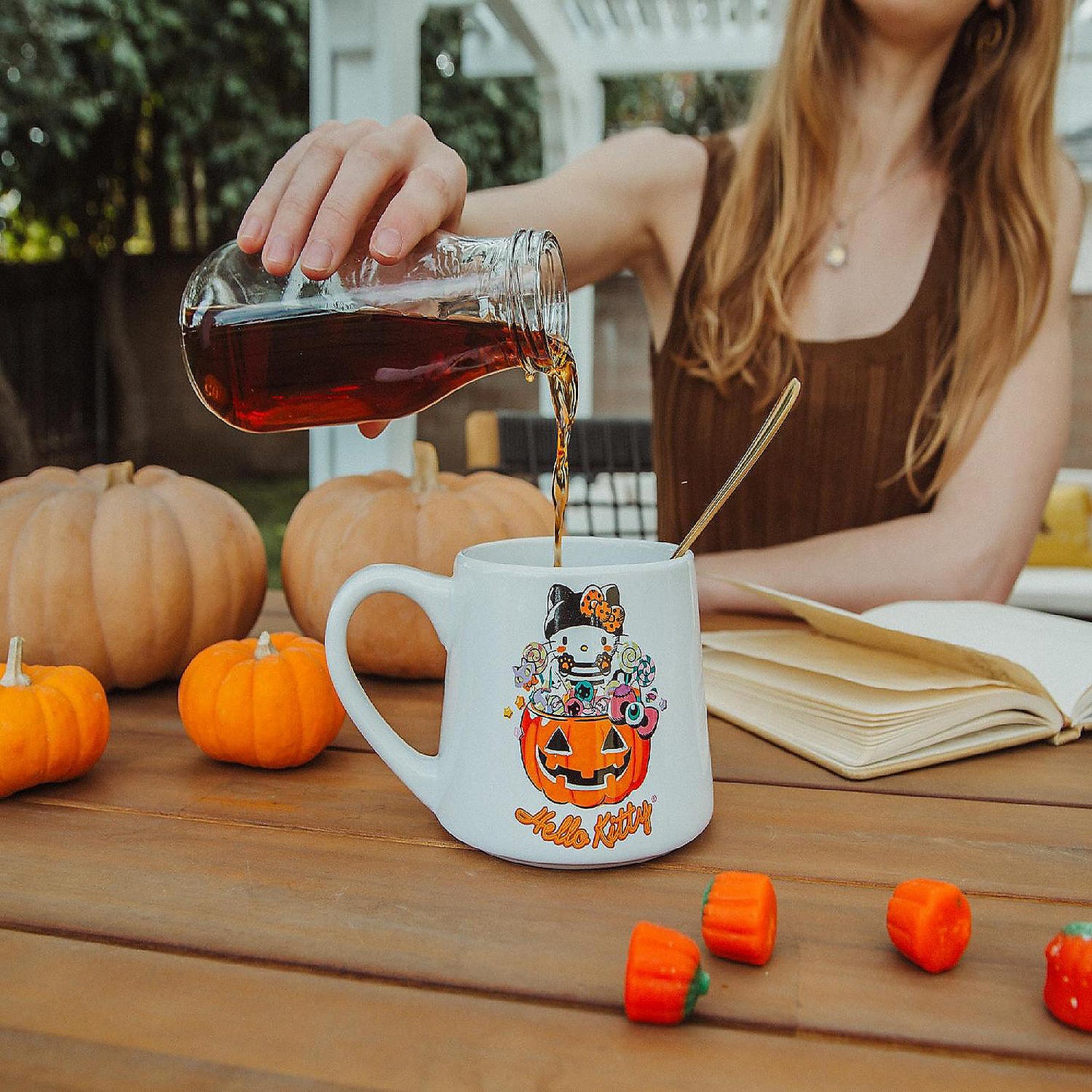 Sanrio Hello Kitty Pumpkin Candy Burglar Tapered Pottery Mug Holds 14 Ounces | USA Decoration®